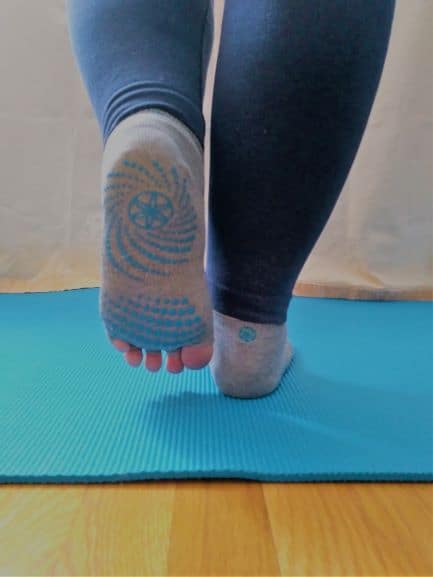 single limb stance balance on yoga mat